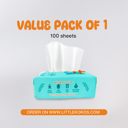 A turquoise pack of Koko Wipes – 100% Dry Cotton Wipes (1 Pack) with white sheets pulled out and product details displayed on the packaging.